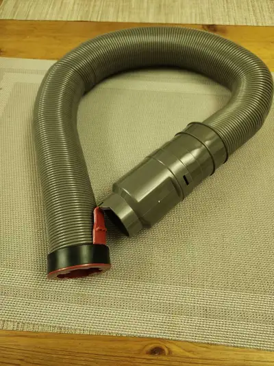 This is a new Dyson vacuum cleaner hose attachment designed for DC40, DC41, DC55, DC65 and DC75 mode...
