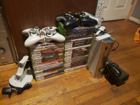 X box 360, two GB storage, 43 games, 4 controllers etc