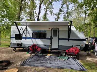 Own this like new, clean, easy to pull, ready to go family travel trailer. Save money on gas towing...