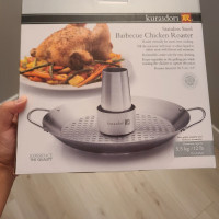stainless steel barbecue chicken roaster. beer can chicken. BBQ.