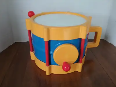 Vintage Toy Drum with turn crank and drum stick (little tikes), View more