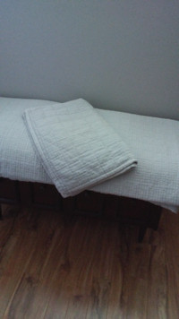 Gray quilt and pillow shams