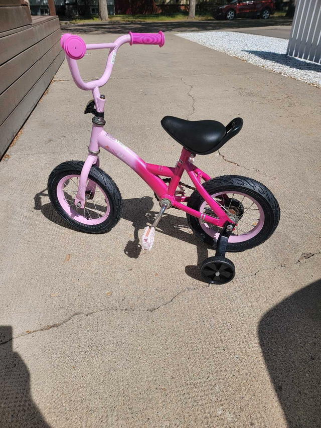 12 inch pink kids bike in Kids in Medicine Hat