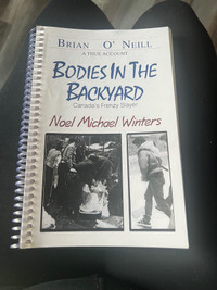 Bodies in the backyard book signed 