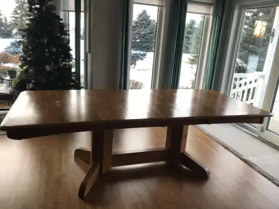 For Sale Oak dining table with 8 chairs. Table is very sturdy. Bought new in 2008. Comes with 2-18”...