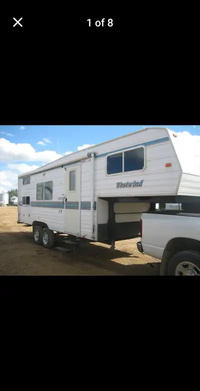 1999 Westwind camper Master bed, two bunkbeds, fold down couch and table, awning, can be pulled with...