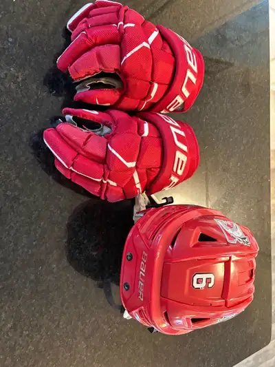 red hockey helmet and gloves, View more