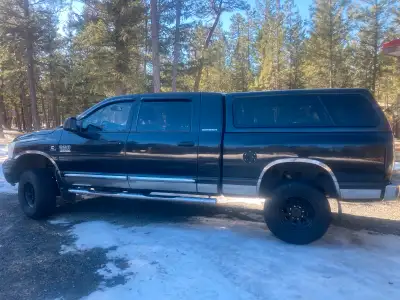 5.9 Cummins diesel 365,000 km Mega cab, Laramie edition (all 2007 options including DVD player) Matc...