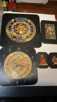 Wood and brass wall art set from Mexico.
