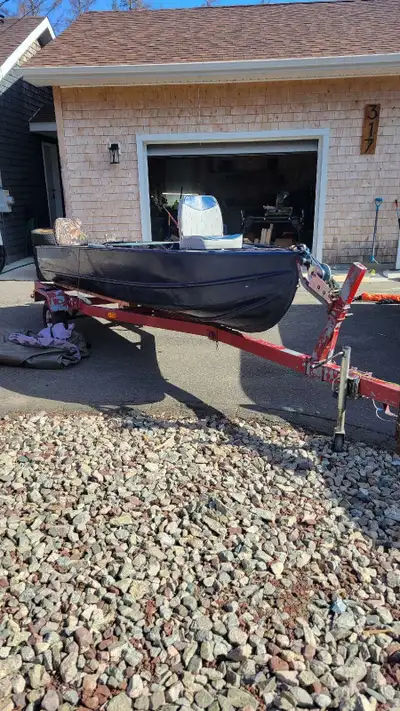 I'm selling my 14-foot aluminum boat motor and trailer. * Includes: Boat with cover, mercury 9.9 hp,...