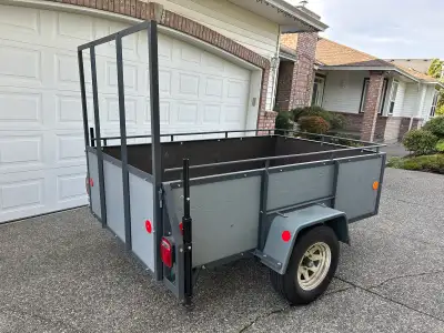 5x8 utility trailer c/w tailgate ramp, radial tires, 3500lb axle, $2500.00 firm. Paul (604)341-9253