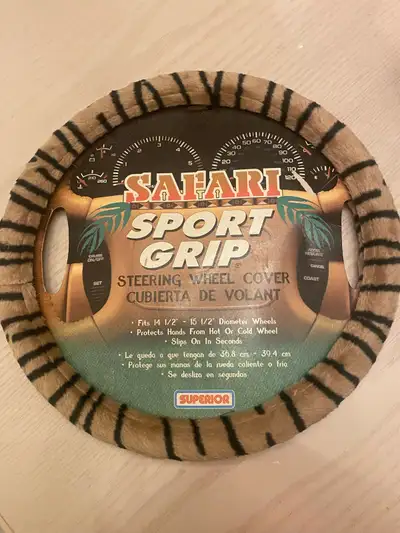 Add a touch of safari to your ride with this new Safari Sport Grip steering wheel cover! Designed to...
