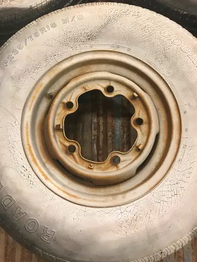 15 inch VW bus rim $25. This is a crows foot no date stamp and doesn't hold air very long. Rust pitt...