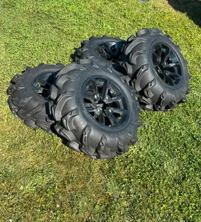 28” Mega Mayhem tires mounted on 14” CanAm wheels. 28x9x14 front tires 28x11x14 rear tires. Great sh...