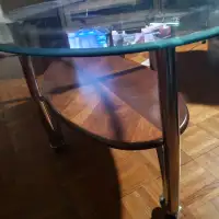 Coffee table.  Glass and metal. Chrome. Legs