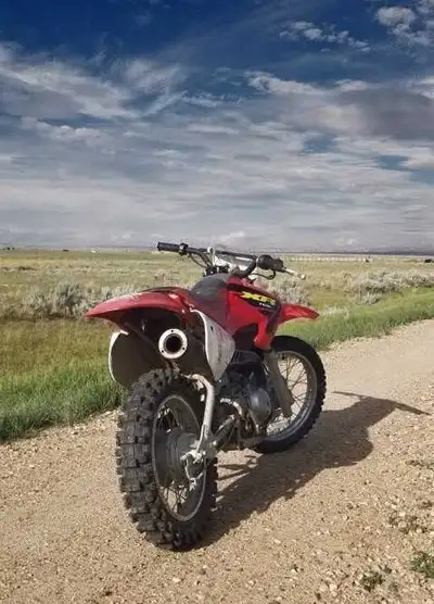 This Honda XR70 is a fun, nimble, and reliable dirt bike perfect for young riders looking to explore...