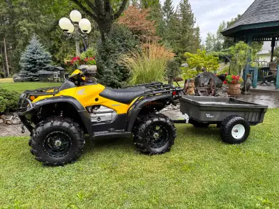 Very sharp looking unit, runs good, excellent condition. Quad includes brand new front & back racks,...