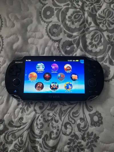 Modded OLED Vita, 100s of games $125