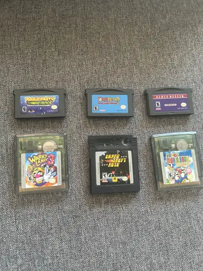PRICES - OBO Wario Land 3 - $40 Super Mario Bros Deluxe - $25 Namco Museum - $10$ Mario Party Advanc...