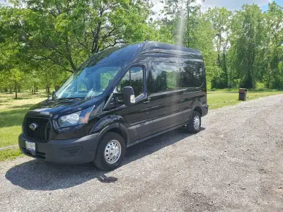 This Ford Transit limousine bus is equipped with luxurious seating, ambient lighting, and a premium...