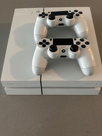 White PlayStation 4 Console with 2 controllers