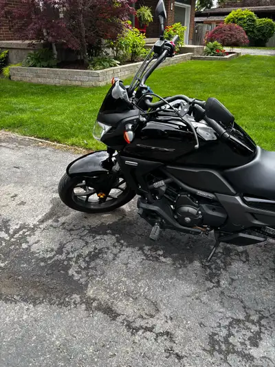Looking to sell my Honda CTX700NA Currently has 13327 kilometers on it, has newer tires less then 10...