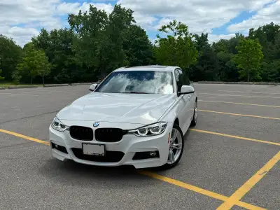 Selling my 2017 BMW 330i xDrive M Sport in Alpine White with black leather interior and aluminum spo...