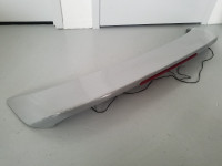 Rear spoiler with stop light