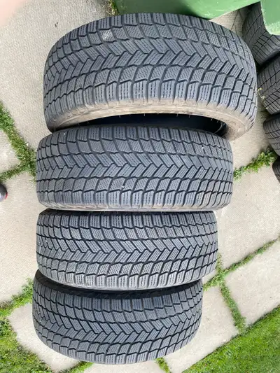 A set of 4 Top of the line Michelin Winter Tires with 10/32 tread left on the tires so just like new...
