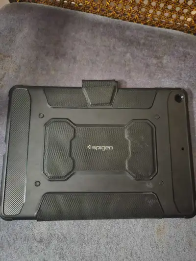 This Spigen Tablet Case is designed to provide robust protection for your tablet, with a rugged exte...