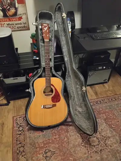 Electric/acoustic guitar with hardshell case., View more