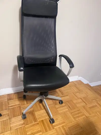 This is a used IKEA Markus office chair in black that's great for any home office setup, offering ex...