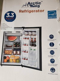 Brand new (in box) Arctic King 3.3 cu ft mini bar fridge. $120!