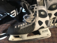 Skates, helmet, gloves and  hockey bag 
