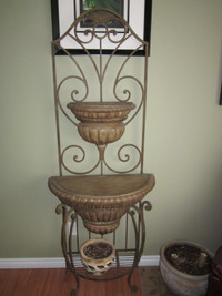 Plant stand for sale.