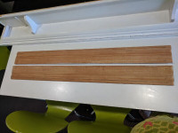2 Brown baseboard pieces