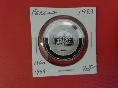 1983 Fergus Dollar 17GM .999 $20 The 1983 Fergus Dollar is a commemorative coin issued by the town o...