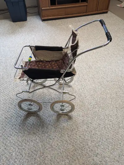 Vintage Doll Stroller. Toy. Metal and cloth. Adjusts to lay down or sit up, also folds down for stor...