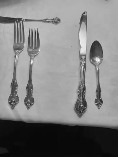 "1847 Rogers Heritage" 12 setting silver plated flatwear. Set includes dinner knife, dinner fork, sa...