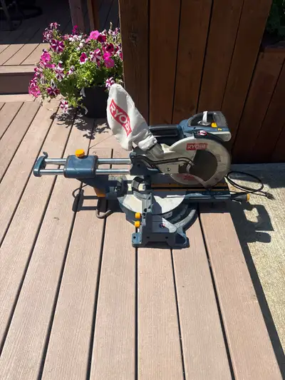 • Ryobi corded sliding compound miter saw, 10-inch • It features a 13-amp motor and an Exactline las...