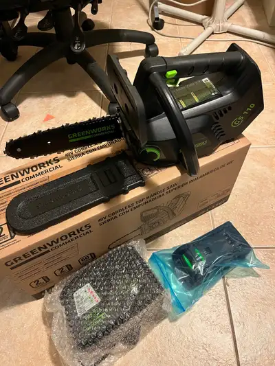 BNIB Greenworks 10 “ brushless COMMERCIAL top handle 40V chainsaw. Light weight. Low noise. More saf...