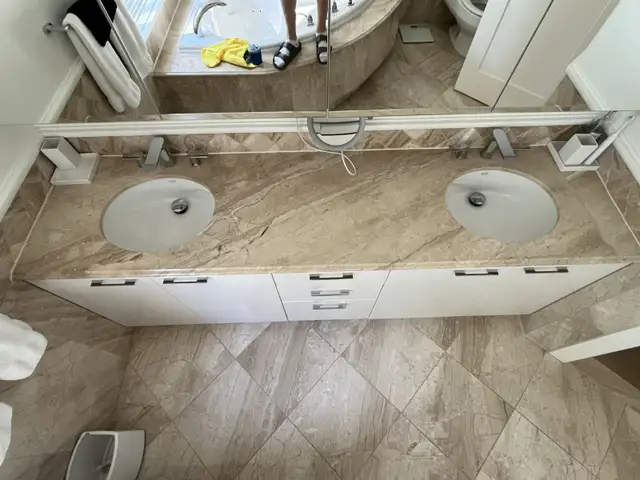 Marble Bathroom Countertop with Two Sinks and Two Faucets