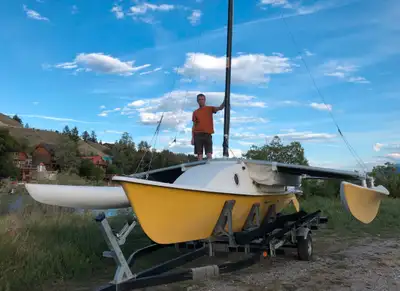 23 ft fibreglass trimaran. Factory built. All sails and rigging complete. 6 HP Suzuki outboard. Trai...
