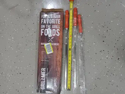 New 10 pack ,23 inches long ,wooden handles , GRILMER , see specs on Amazon, located in Kenilworth o...