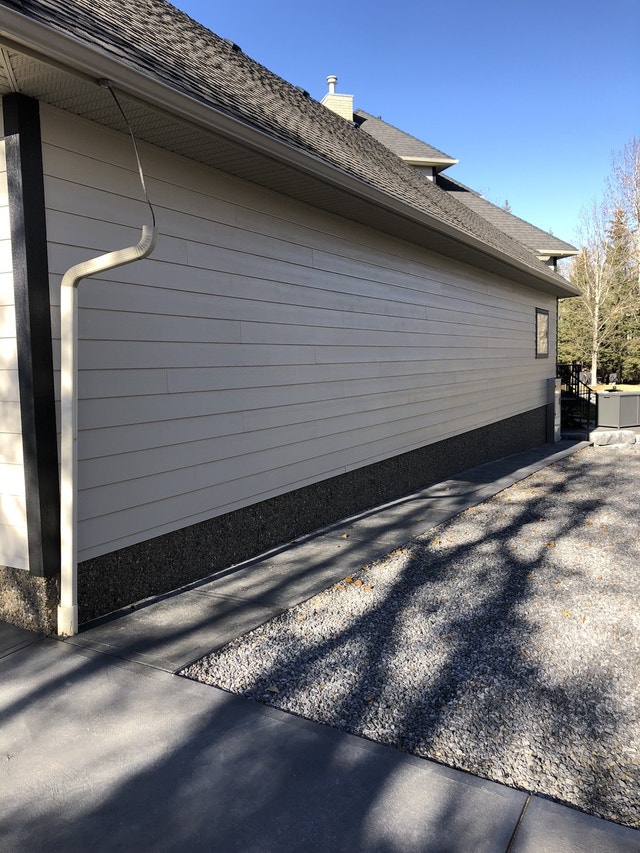 Exterior EstimatesJames Hardie Board Siding & Eavestrough Fence