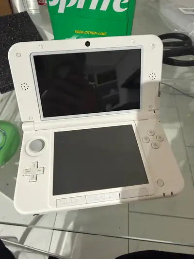 Good condition 3ds xl pink and white, View more