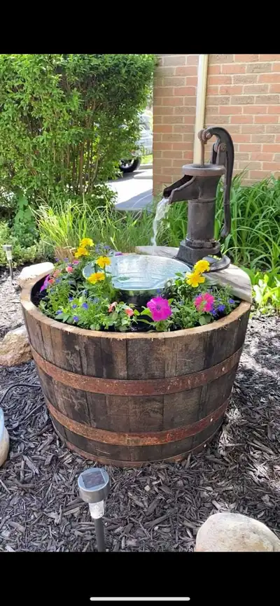 whiskey Barrel Planters - starting $29, View more