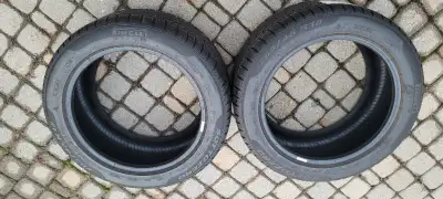 pair 265 45 18 Pirelli winter snow tires Sottozero 240 series ii at least over 50% Trade for other 1...