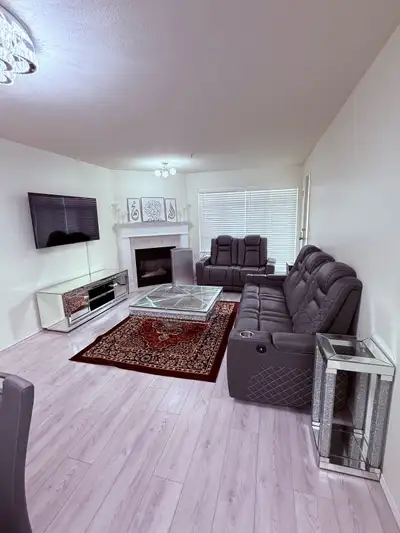 This beautifully renovated 2-bedroom apartment, offers the comfort and size of a main-level home. Re...