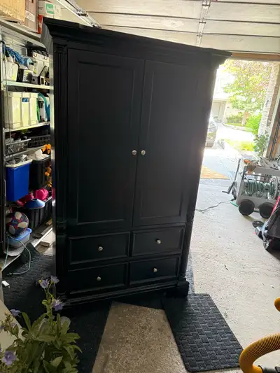 Beautiful black wardrobe / armoire 36” inches width 18” Depth 66 1/2”Height The top trim is 40” in w...
